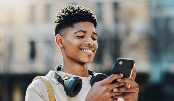 teenager looking at their phone